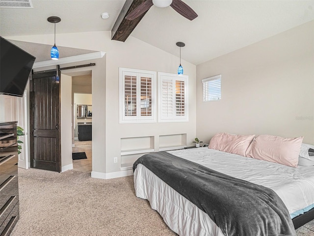 bedroom featuring visible vents, baseboards, light colored carpet, lofted ceiling with beams, and a barn door