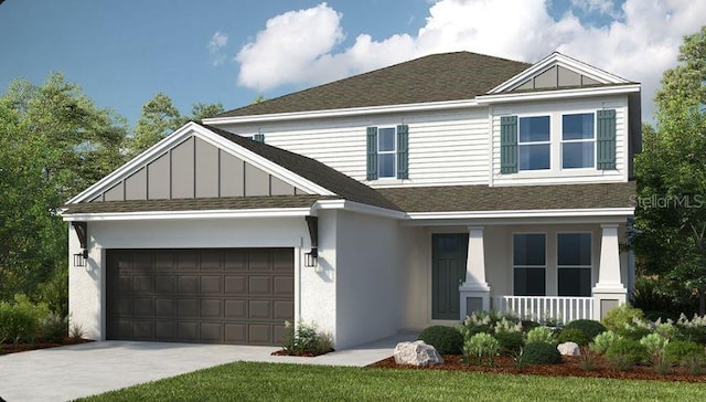 craftsman inspired home with board and batten siding, a shingled roof, concrete driveway, covered porch, and a garage