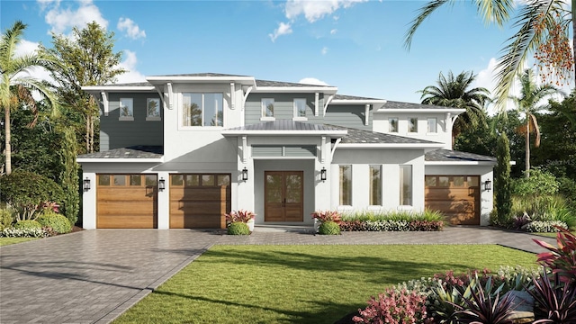 view of front facade with an attached garage, decorative driveway, and a front yard