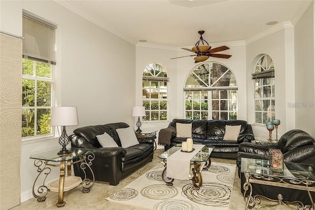 interior space with ceiling fan and ornamental molding