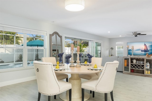 dining space featuring recessed lighting, baseboards, light wood-style flooring, and ceiling fan