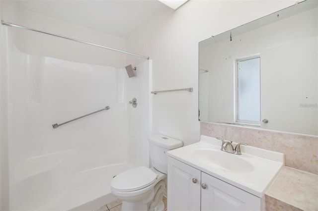 full bath with vanity, toilet, and a shower