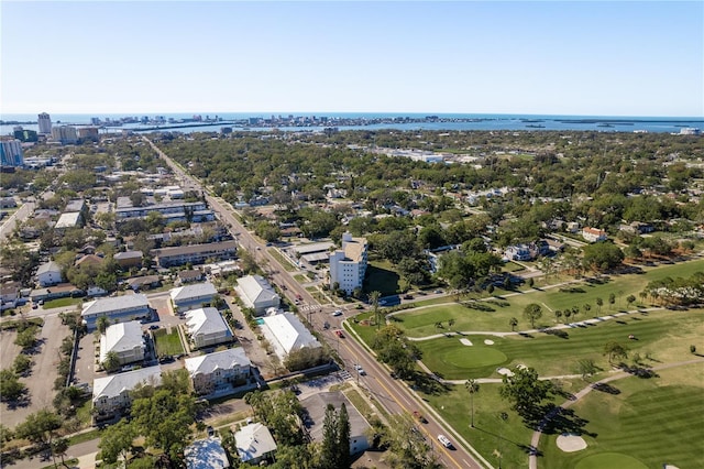 bird's eye view with a water view and view of golf course