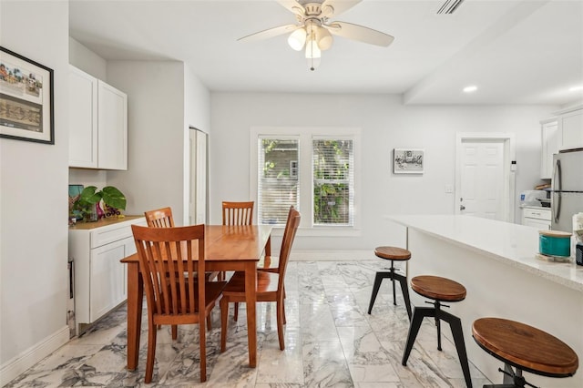 dining area with a ceiling fan, visible vents, baseboards, recessed lighting, and marble finish floor