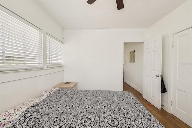 bedroom with ceiling fan and wood finished floors