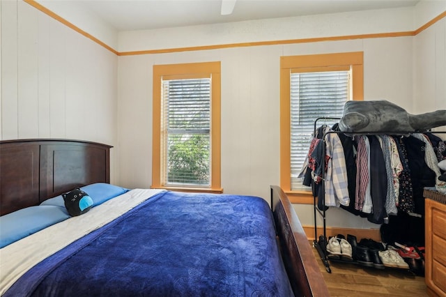 bedroom featuring wood finished floors