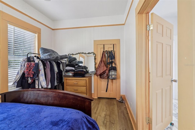 bedroom with wood finished floors