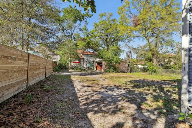 view of yard featuring fence