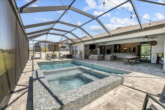 view of swimming pool featuring ceiling fan, outdoor lounge area, glass enclosure, and a patio