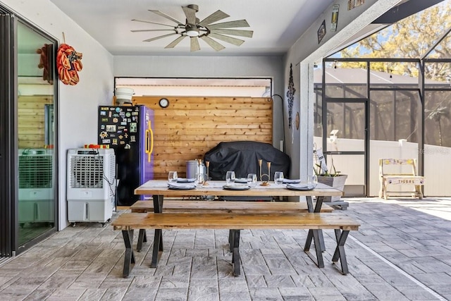 dining room featuring ceiling fan