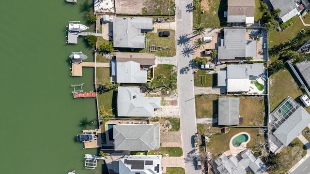 birds eye view of property with a residential view