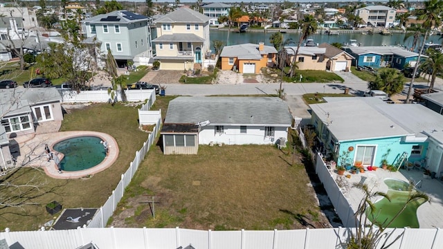 aerial view featuring a residential view and a water view