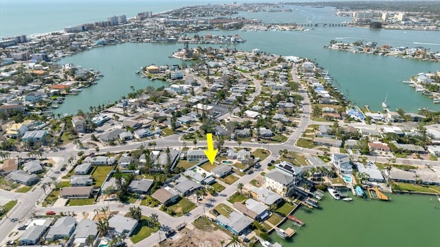 bird's eye view featuring a residential view and a water view