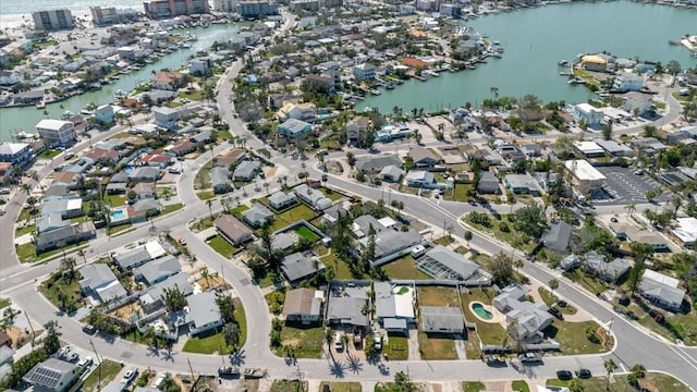 bird's eye view featuring a residential view and a water view