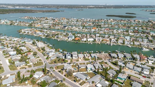 birds eye view of property with a residential view and a water view