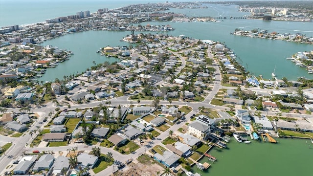 drone / aerial view featuring a water view and a residential view