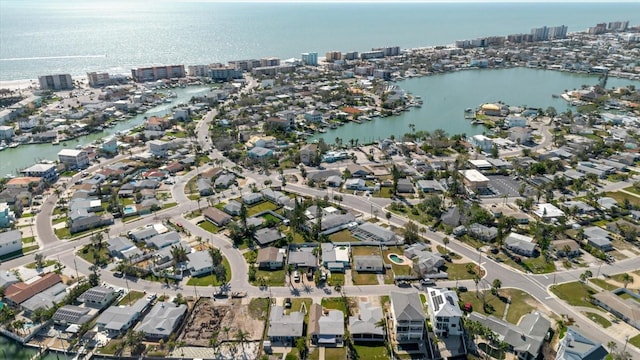 birds eye view of property featuring a residential view and a water view