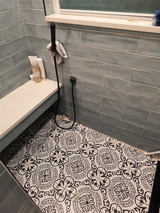 bathroom featuring tile walls and tile patterned floors
