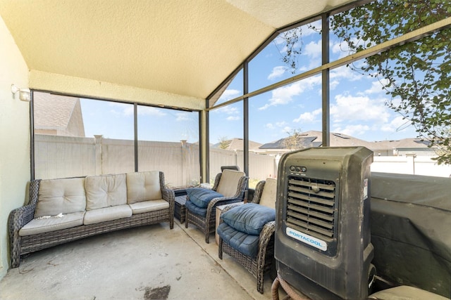 sunroom with vaulted ceiling