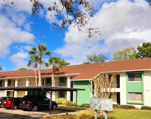 view of property with covered parking