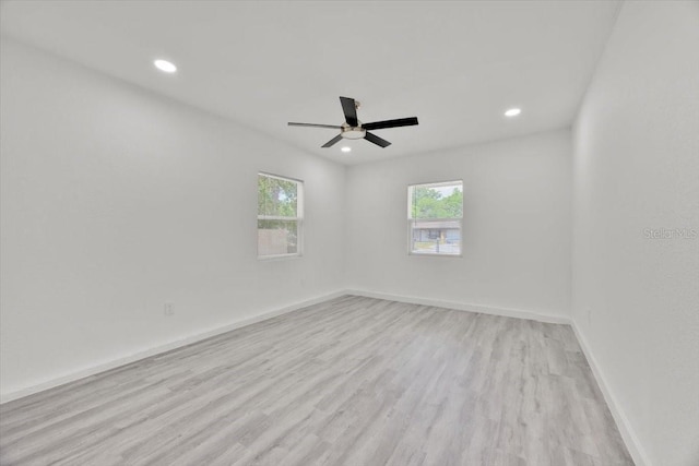 2415 Sutton Rd, Lakeland, FL 33810 - spare room with plenty of natural light, recessed lighting, light wood-style flooring, ceiling fan, and baseboards