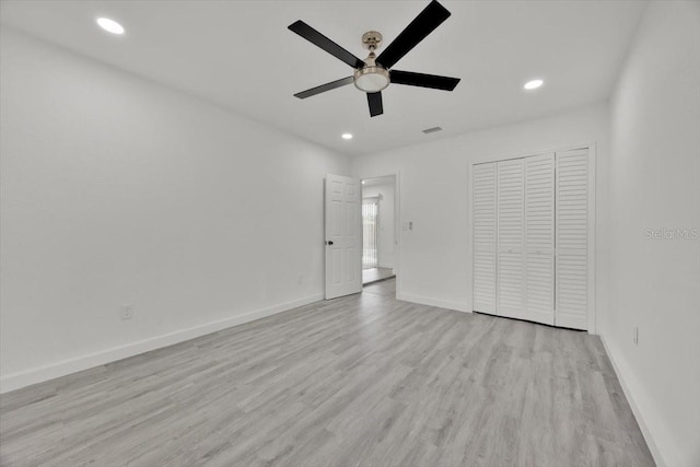 2415 Sutton Rd, Lakeland, FL 33810 - unfurnished bedroom with recessed lighting, light wood finished floors, baseboards, a closet, and a ceiling fan