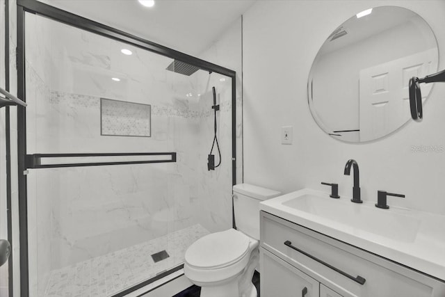 2415 Sutton Rd, Lakeland, FL 33810 - bathroom featuring a marble finish shower, toilet, vanity, and recessed lighting