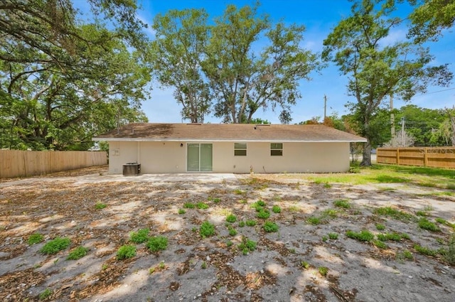 2415 Sutton Rd, Lakeland, FL 33810 - back of house featuring fence