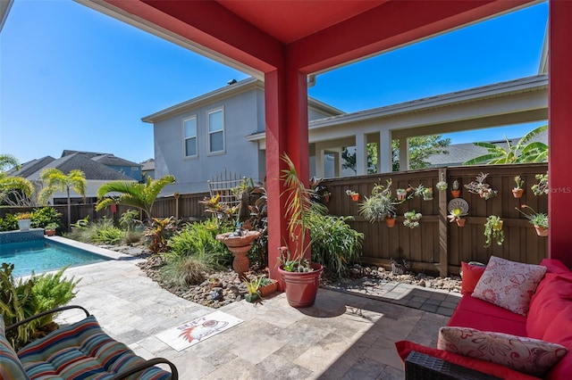 view of patio featuring a fenced in pool and a fenced backyard