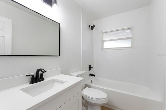 bathroom featuring vanity, toilet, and shower / bathtub combination