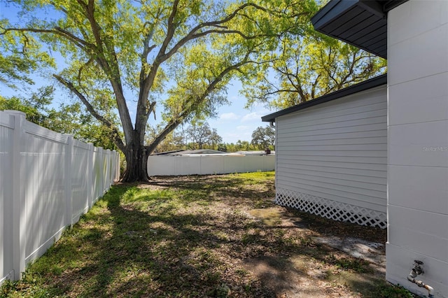 view of yard featuring a fenced backyard