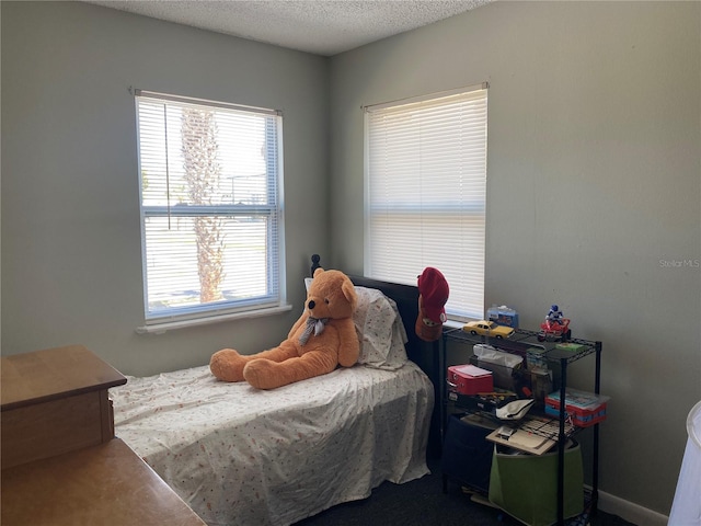 bedroom with a textured ceiling