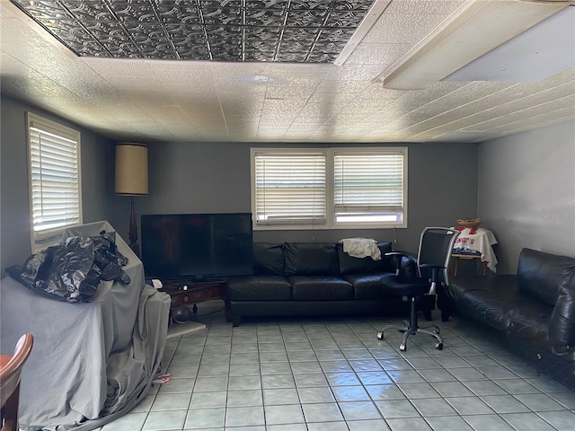 living area featuring light tile patterned floors