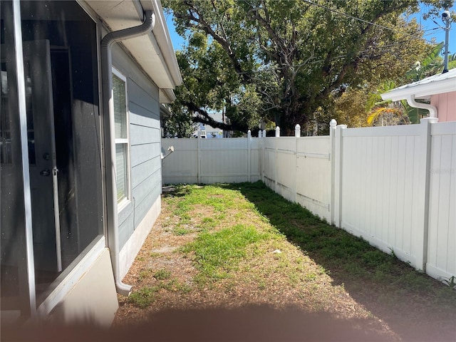 view of yard featuring a fenced backyard