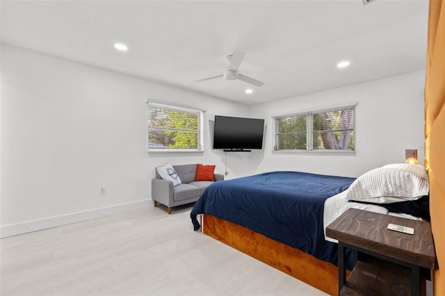 bedroom featuring recessed lighting, wood finished floors, baseboards, and ceiling fan