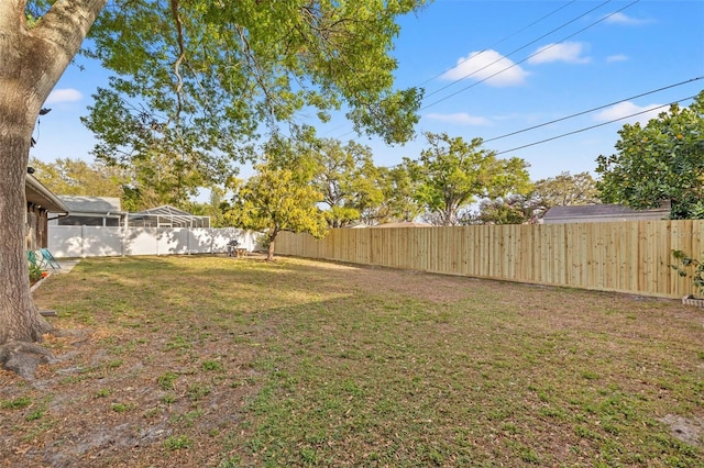 view of yard featuring a fenced backyard