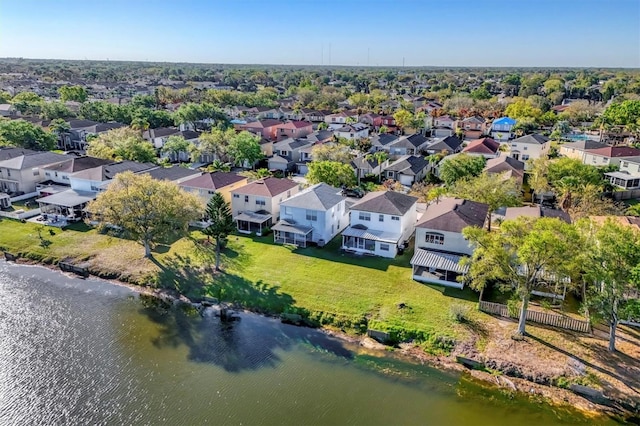 aerial view featuring a residential view and a water view