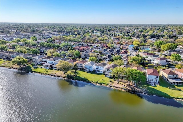 birds eye view of property featuring a residential view and a water view