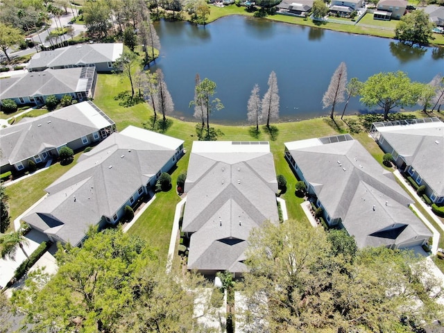 bird's eye view with a residential view and a water view