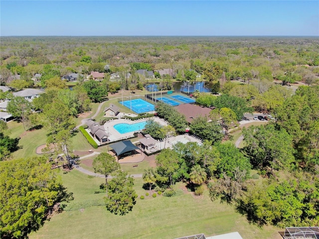 aerial view with a view of trees and a water view