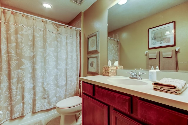 bathroom featuring visible vents, toilet, recessed lighting, tile patterned floors, and vanity