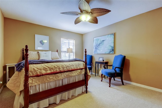 carpeted bedroom featuring a ceiling fan and baseboards