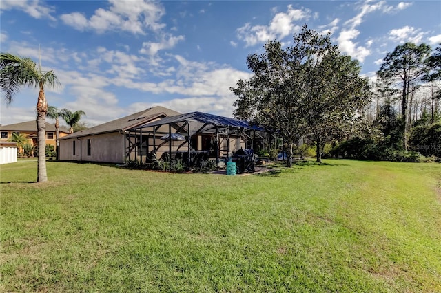 view of yard featuring a lanai