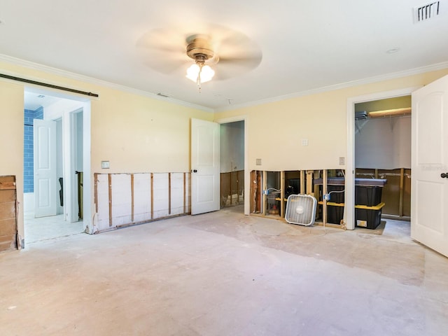 unfurnished room featuring visible vents, concrete flooring, and crown molding