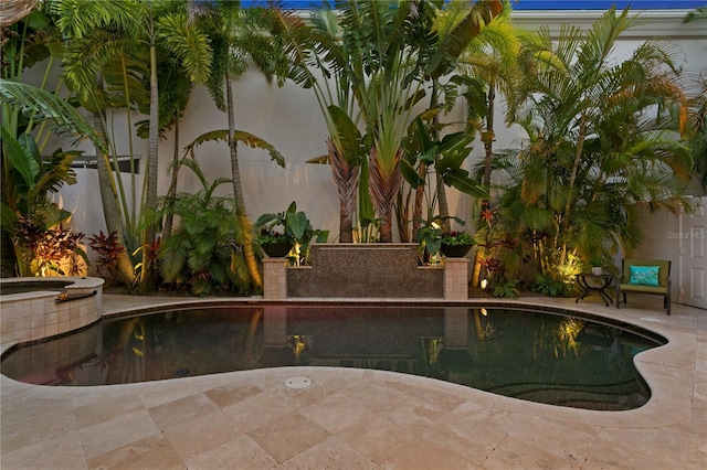 outdoor pool with a patio