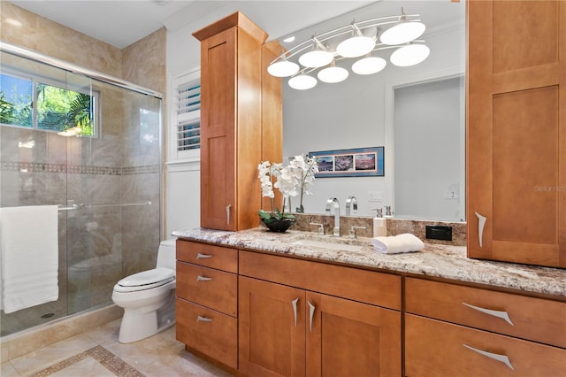 full bath featuring vanity, a shower stall, toilet, and tile patterned floors