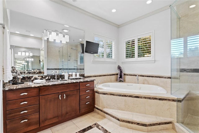 full bath with a stall shower, ornamental molding, tile patterned flooring, a bath, and vanity