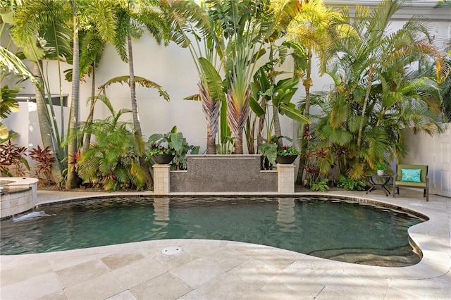 outdoor pool featuring a patio area