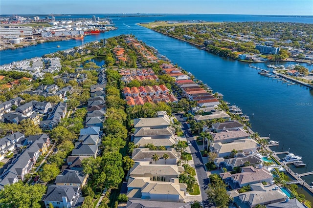 birds eye view of property featuring a water view and a residential view