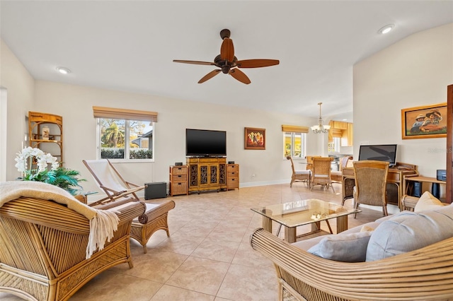 living area with lofted ceiling, ceiling fan with notable chandelier, recessed lighting, light tile patterned floors, and baseboards